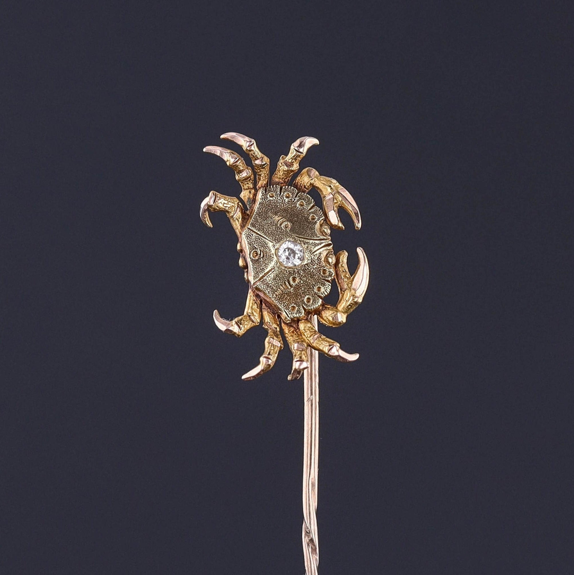 A 14k gold crab stickpin with a diamond accent. Perfect for any man or woman or collector of antique jewelry. The antique pin dates to the early 1900s and is in excellent condition.