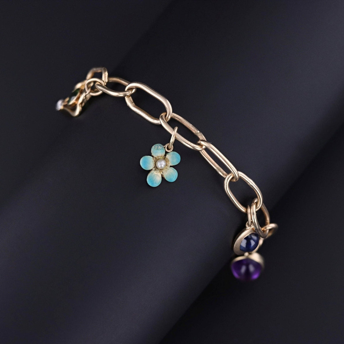 14k Gold Charm Bracelet with 7 Antique Charms - Trademark Antiques