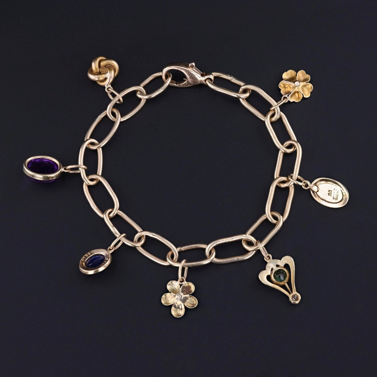 14k Gold Charm Bracelet with 7 Antique Charms - Trademark Antiques
