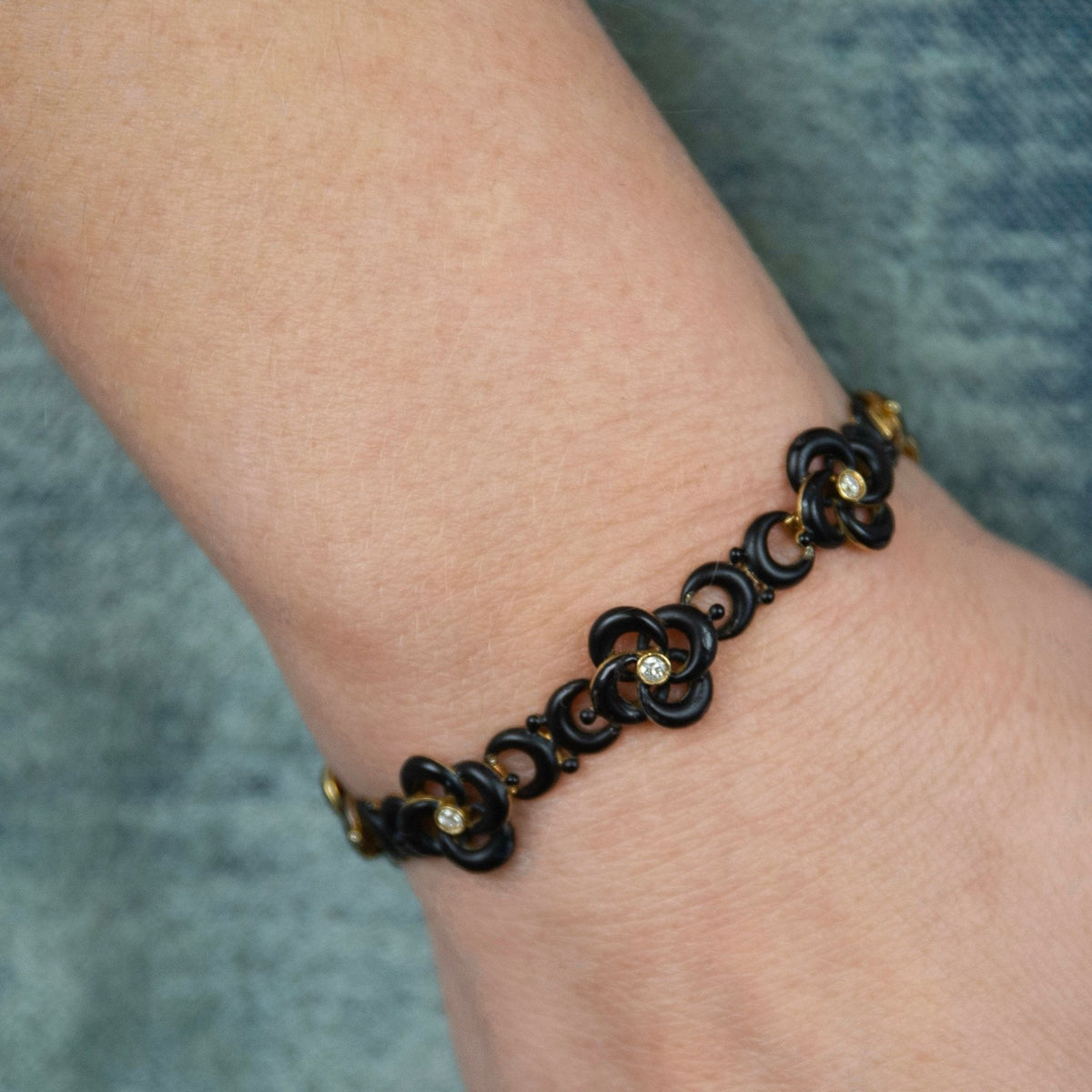 Antique Black Enamel and Diamond Love Knot Bracelet of 14k Gold - Trademark Antiques