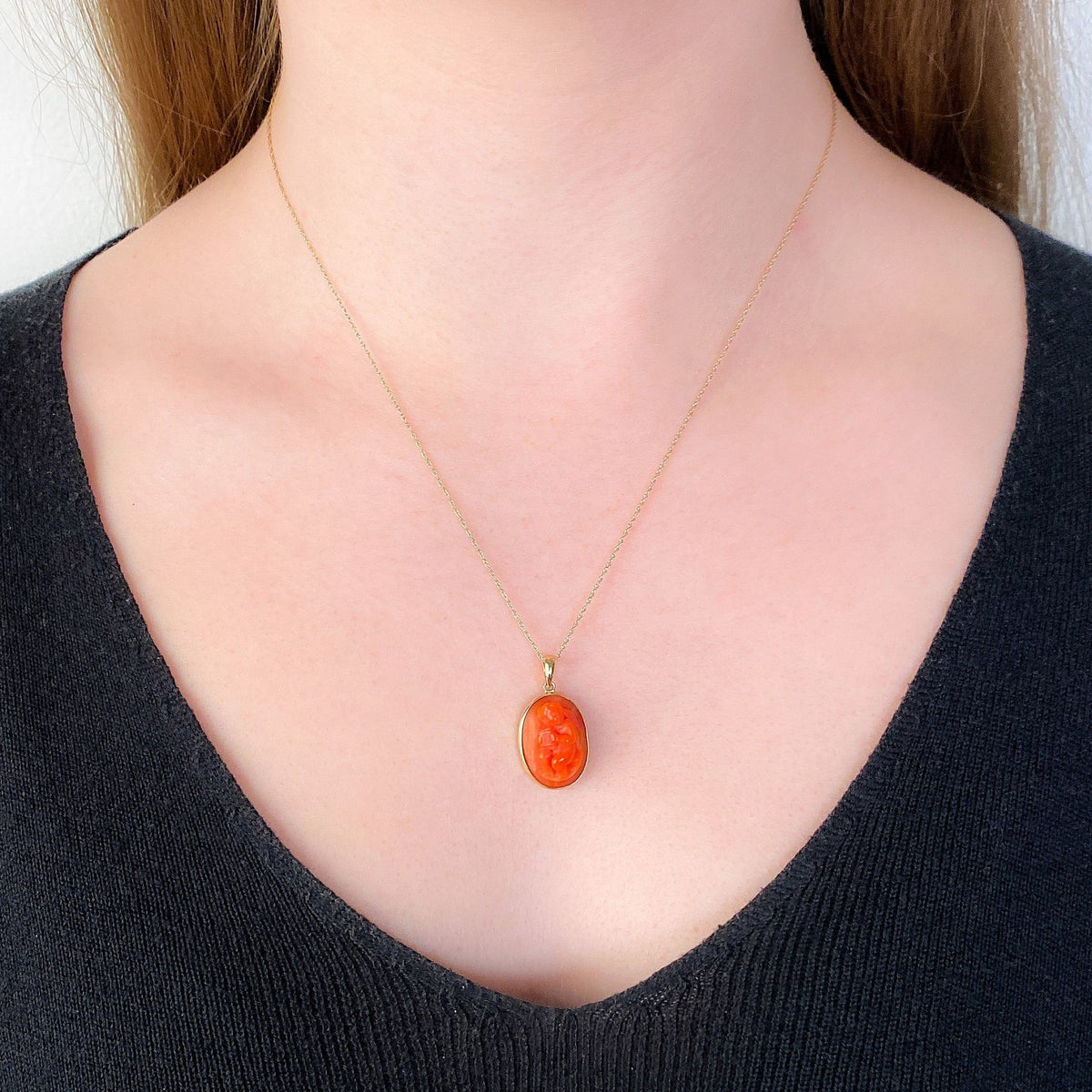 Antique Coral Cherub Pendant of 14k Gold - Trademark Antiques