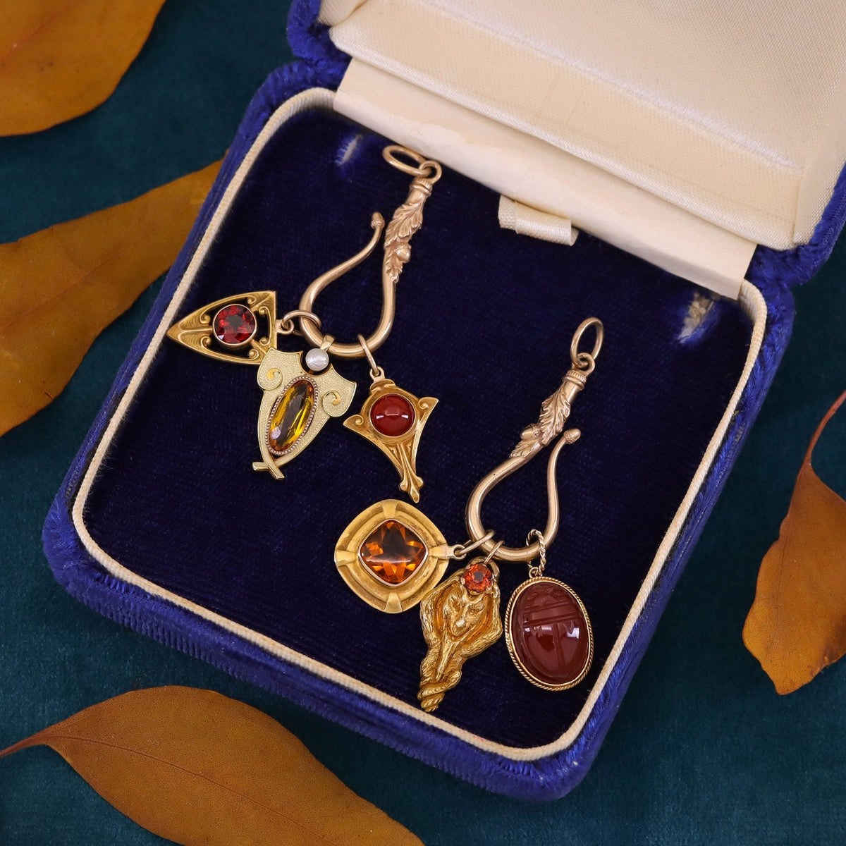 Antique Garnet Green Man Charm of 14k Gold - Trademark Antiques