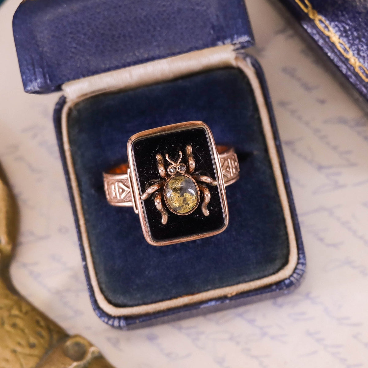 Antique Onyx Insect Ring of 10k Gold - Trademark Antiques