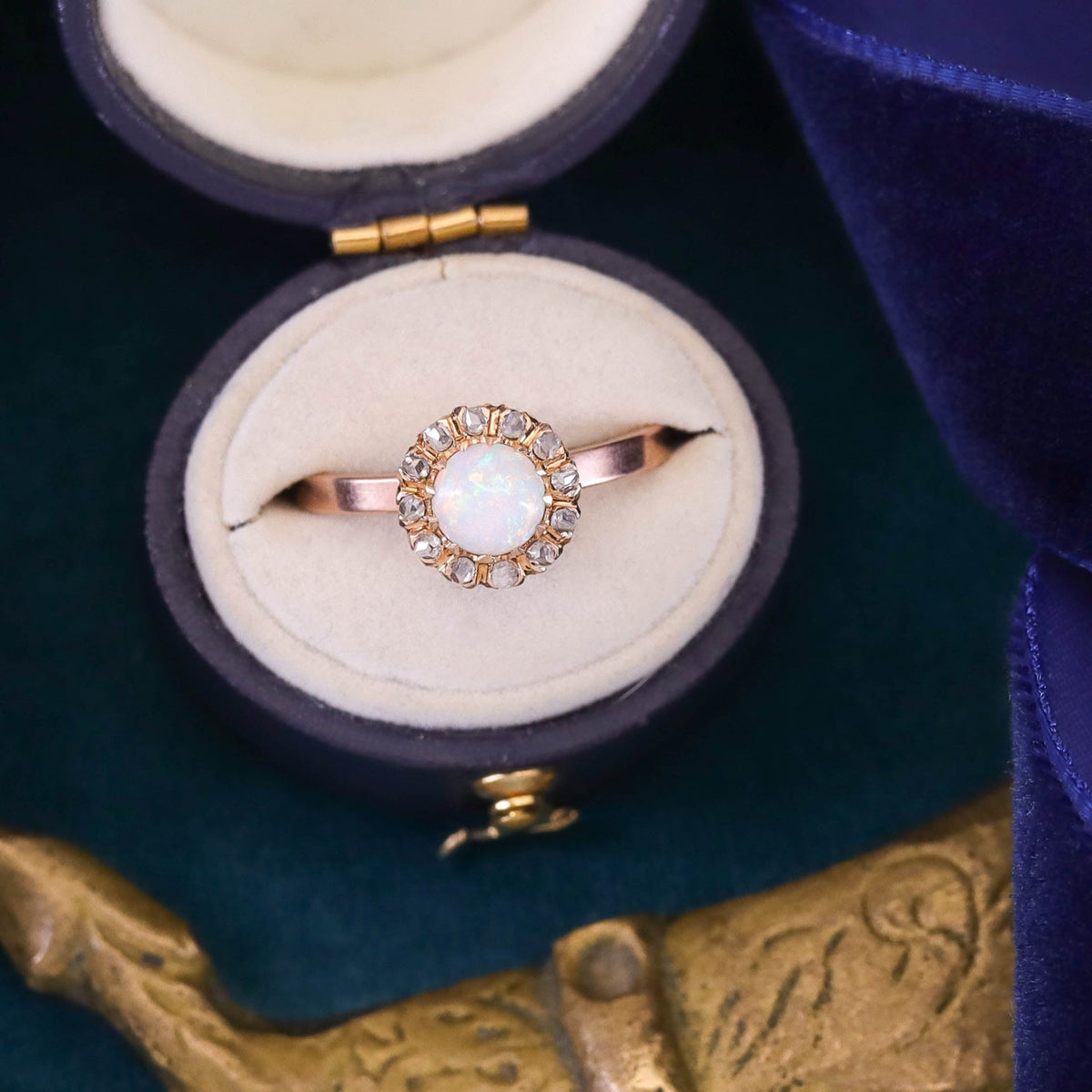 Antique Opal and Diamond Halo Ring of 14k Gold - Trademark Antiques