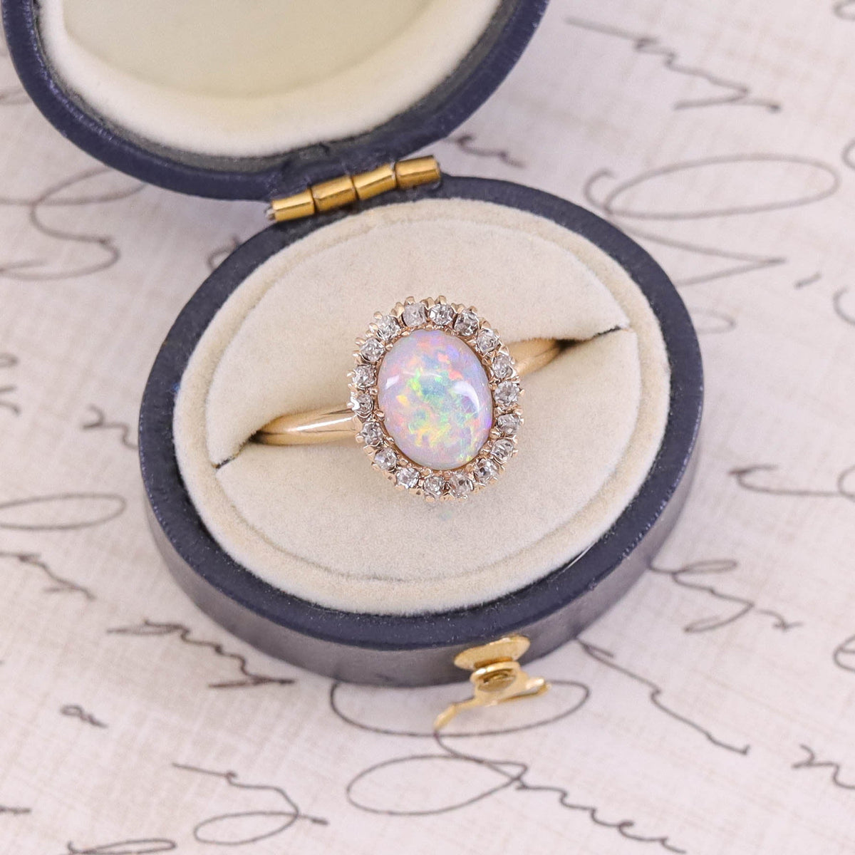 Antique Opal and Diamond Halo Ring of 14k Gold - Trademark Antiques