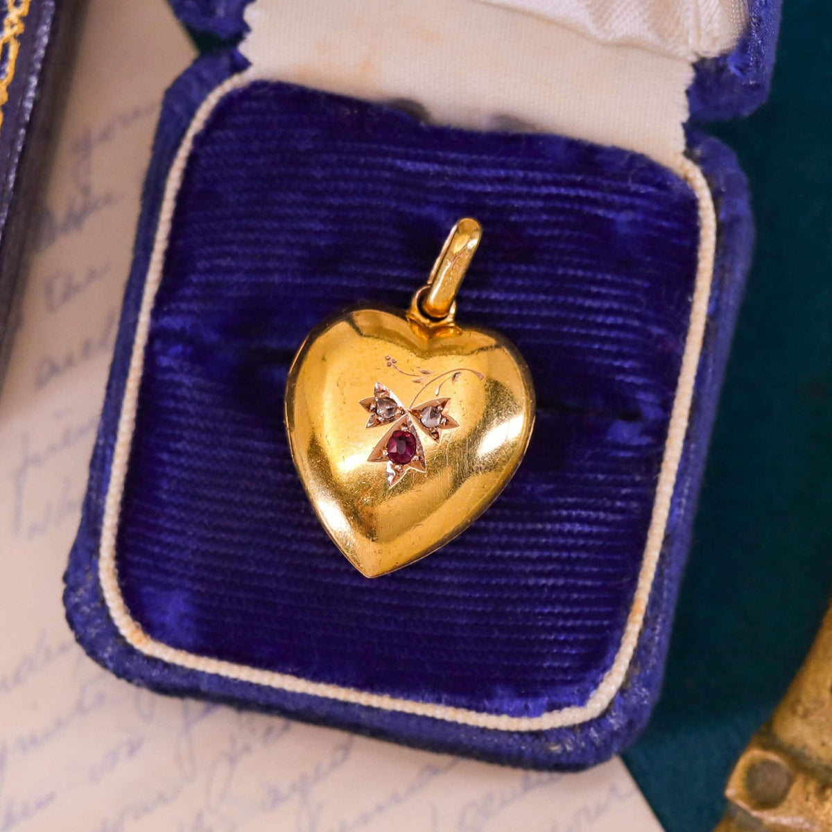 Antique Ruby and Diamond Puffy Heart Locket of 15k Gold - Trademark Antiques