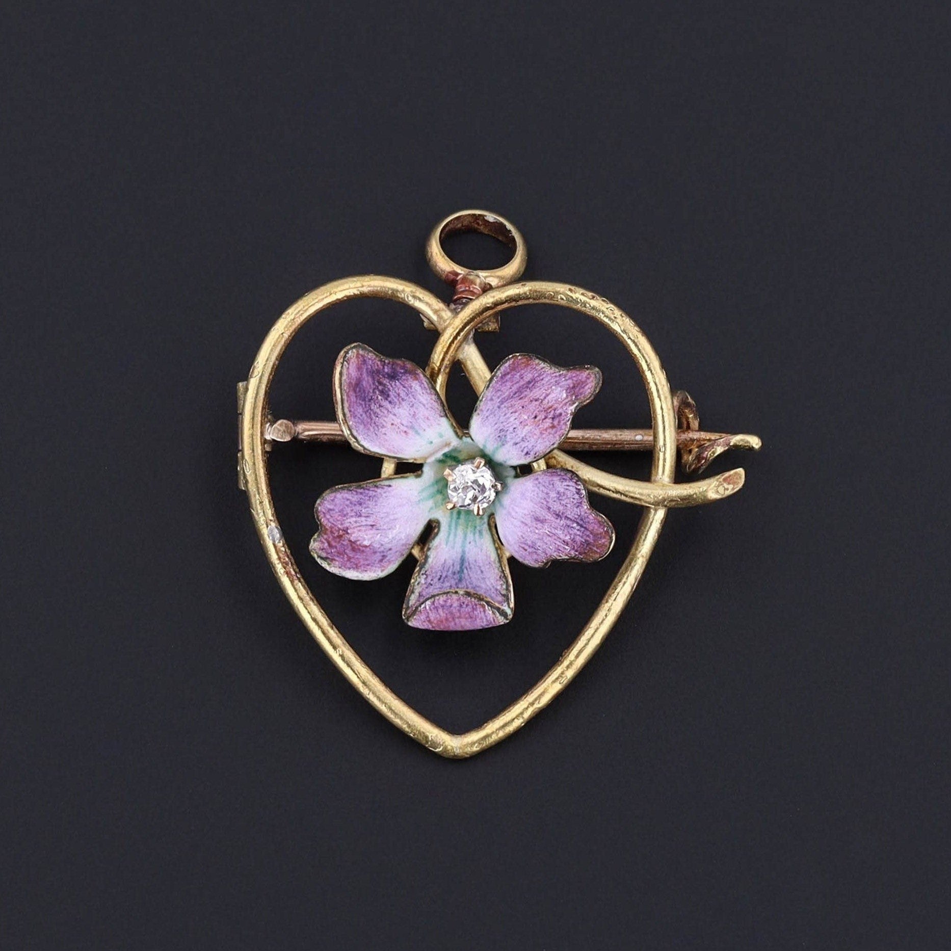 purple enamel flower in a 14k gold heart pendant or brooch