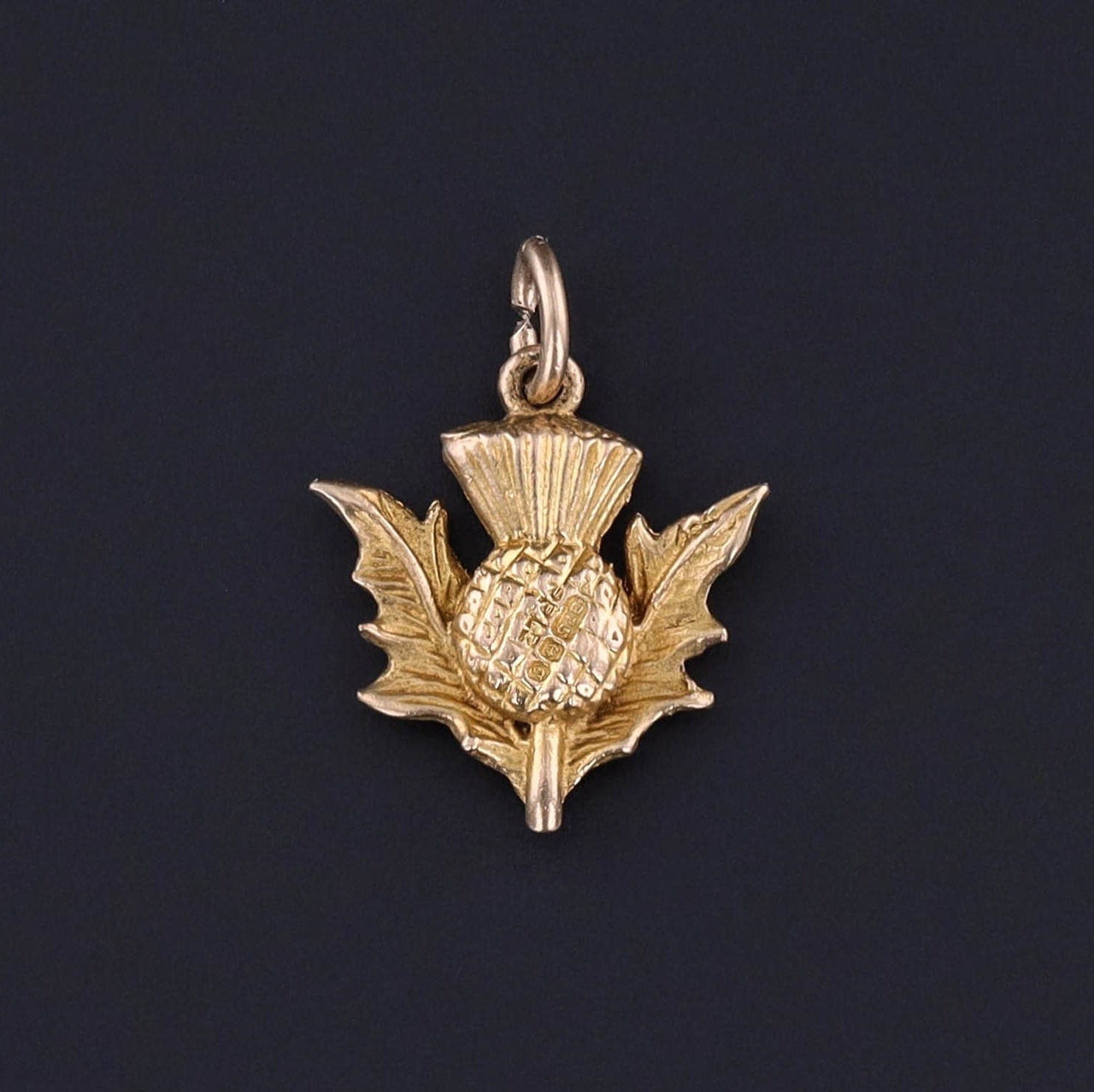 The front of our antique thistle charm. This 1920s thistle charm is made of 10k gold and in very good condition.