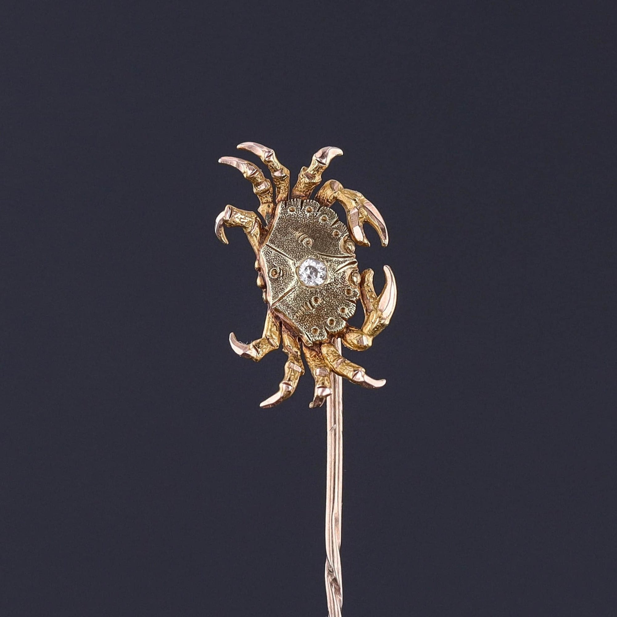 A 14k gold crab stickpin with a diamond accent. Perfect for any man or woman or collector of antique jewelry. The antique pin dates to the early 1900s and is in excellent condition.