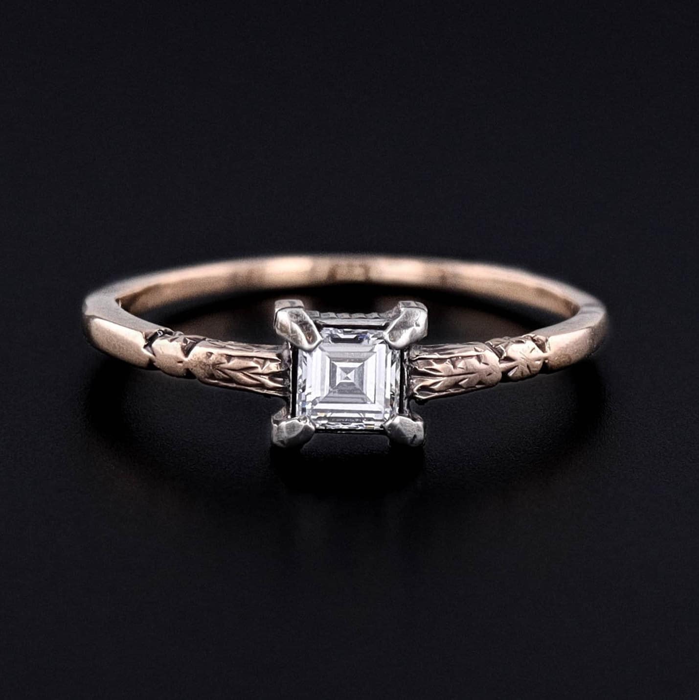 Step into the elegance of the late 19th century with this 1890s ring showcasing an emerald-cut, 0.26 ct diamond set in luxurious 12ct gold. The ring is a size 6, but can be resized free of charge.