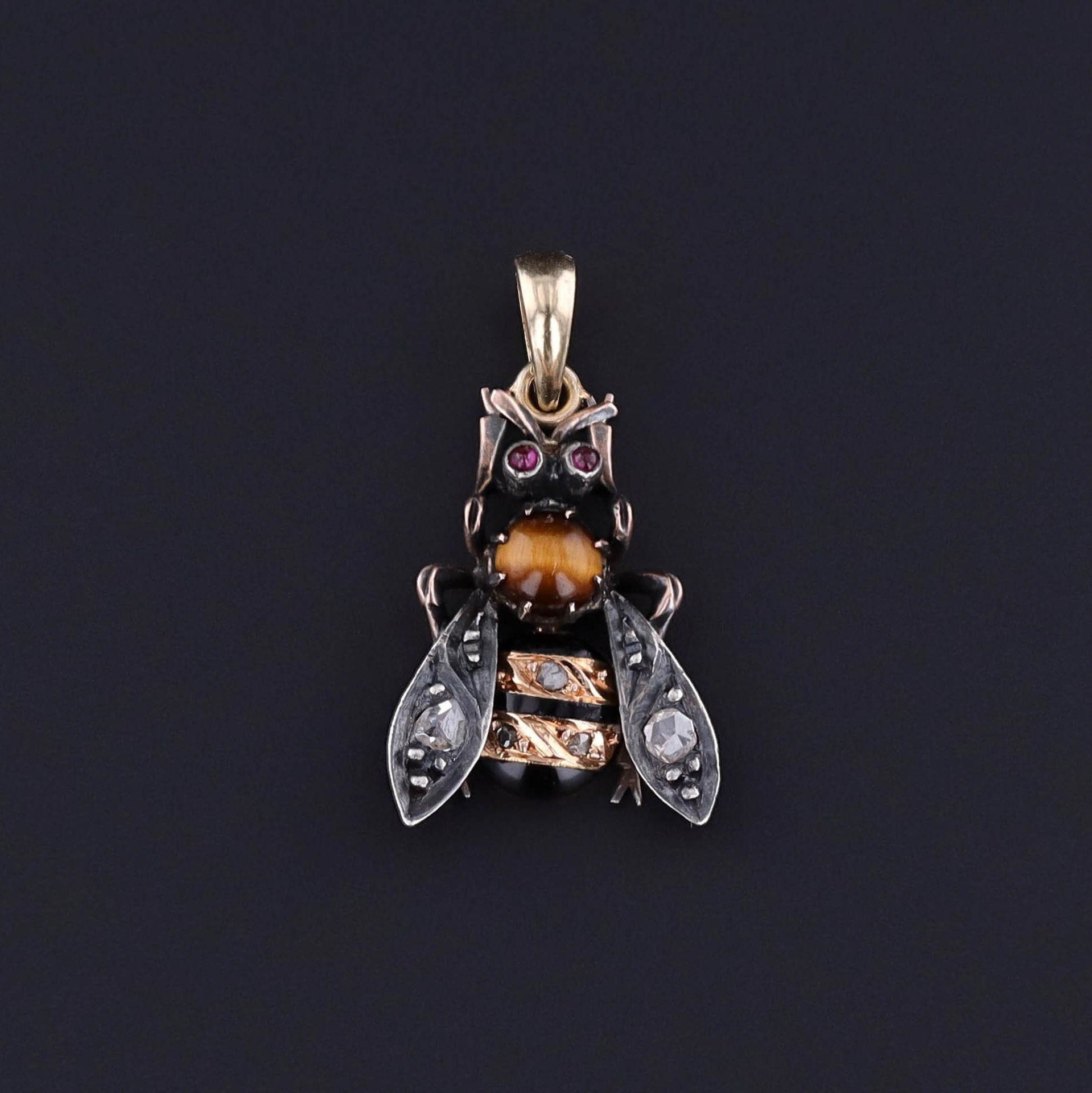 An antique enamel, diamond, and tiger&#39;s eye bee pendant created from a stickpin dating to the late Victorian era. Perfect for any lover of bees or antique jewelry collector.