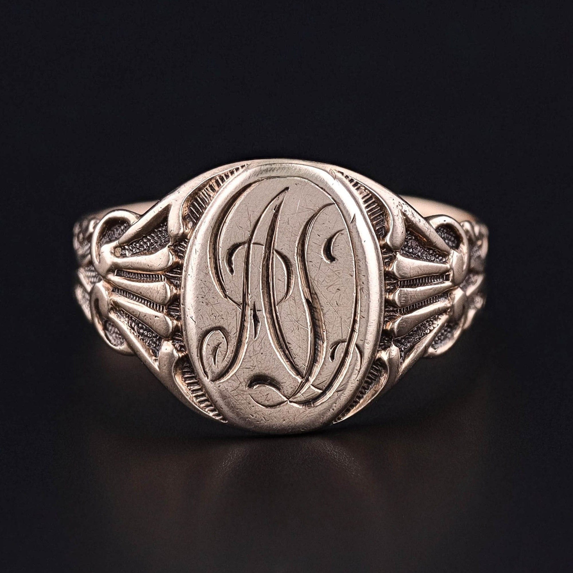 An antique signet ring with the intitials AD. Perfect for anyone who loves someone with the initials AD or anyone who has the initials AD. The ring is pale 9ct gold and in good condition with light surface wear.