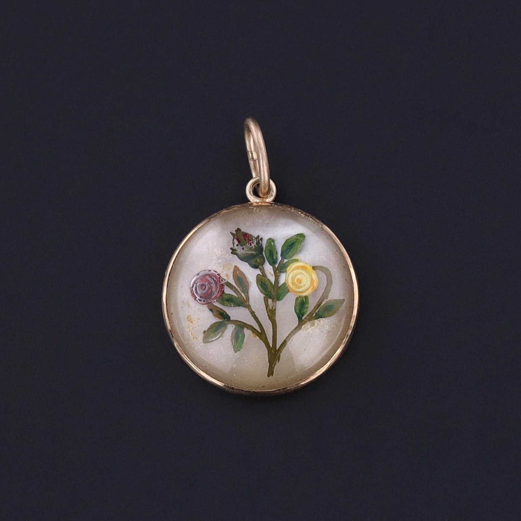 An antique essex crystal rose pendant of 14k gold. The upcycled piece was originally a stick pin.