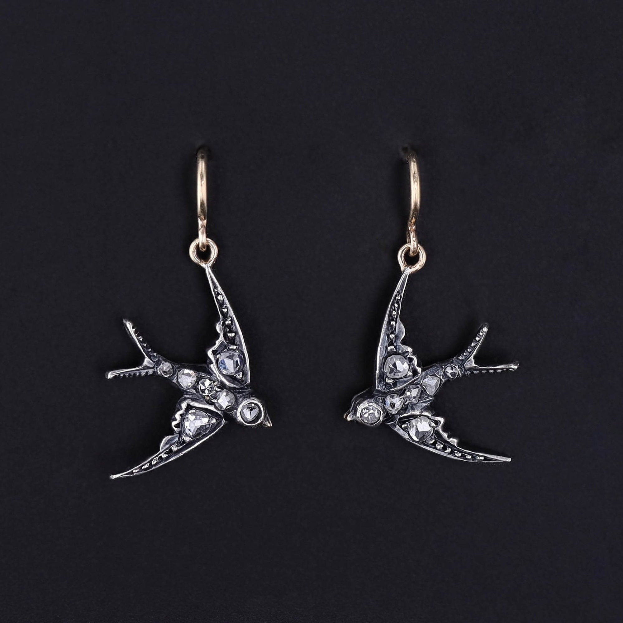 Antique rose cut diamond swallow earrings created from a Victorian era brooch. The swallows are silver topped 14k gold and our jeweler added 14k gold ear wires to the upcycled jewelry. Perfect for any bride or antique jewelry lover.