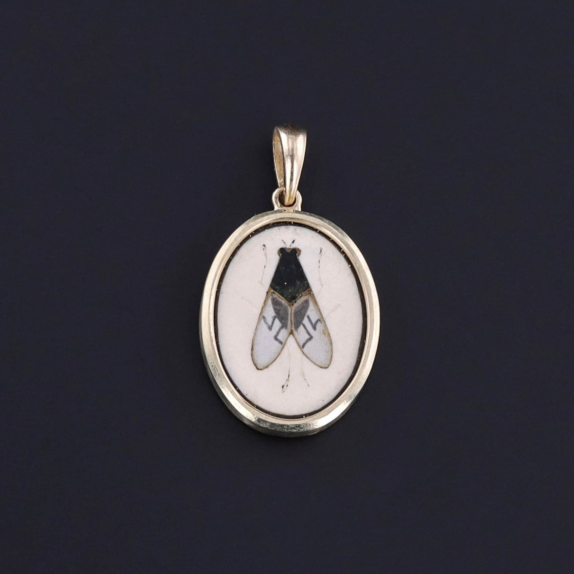 An antique pietra dura fly pendant in 14k gold. This is similar to shibayama but not raised relief.
