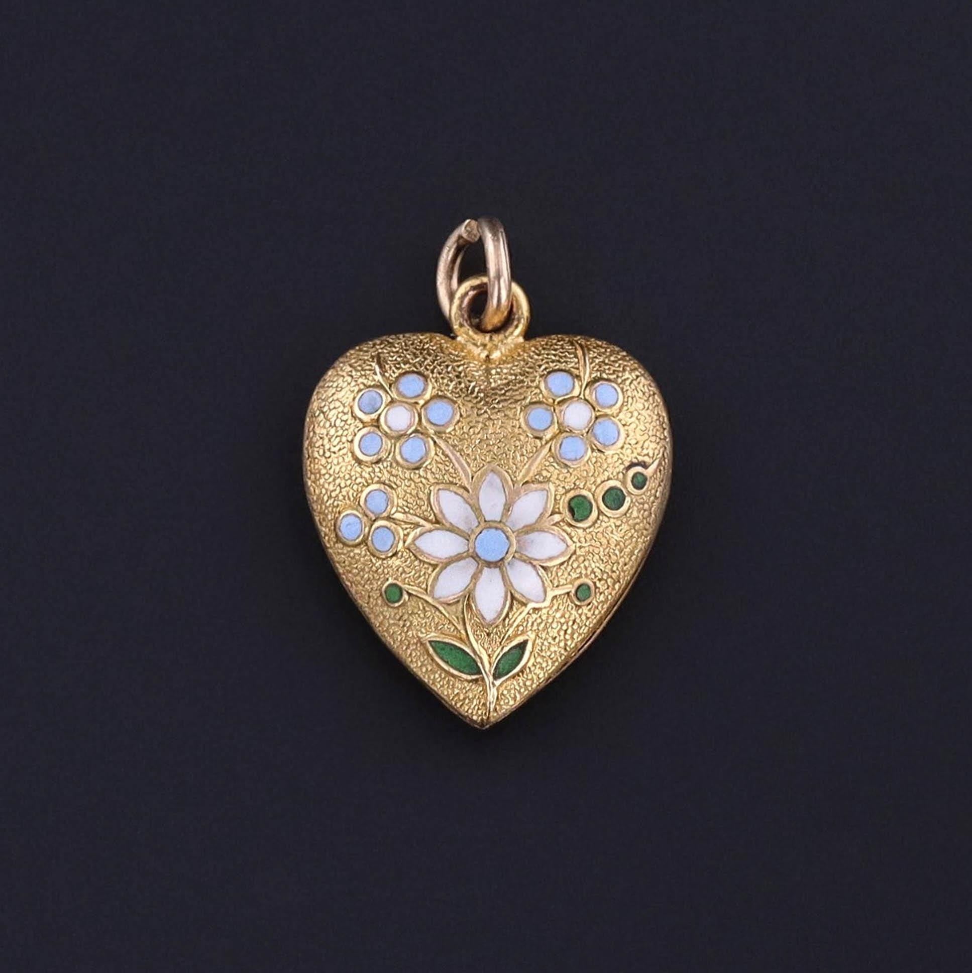 An antique 10k gold and enamel puffy heart charm from the late Victorian era. The charm would be a beautiful love token or perfect gift for an antique jewelry or charm collector.