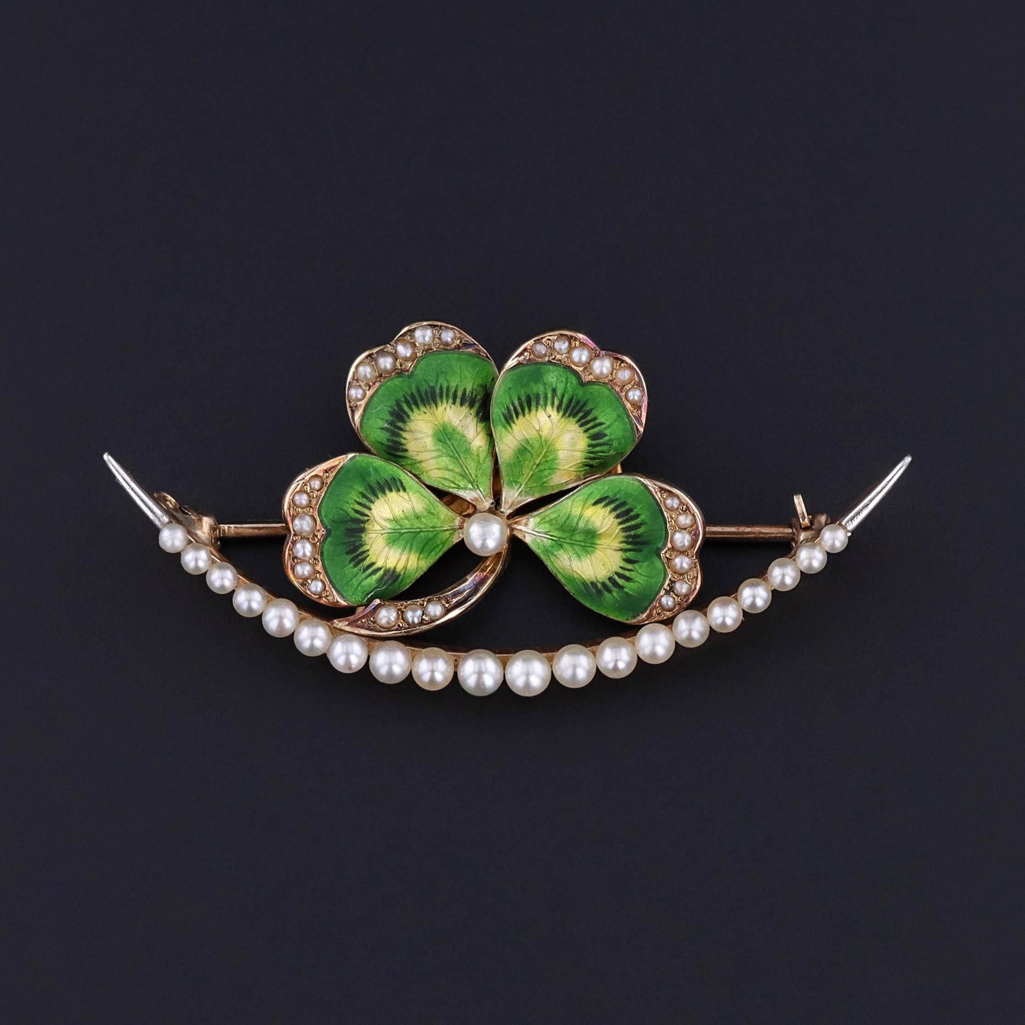 An antique brooch by Krementz & Co. depicting a honeymoon style -- the clover is the &quot;honey&quot; and the crescent is the &quot;moon.&quot;  These were antique love tokens.