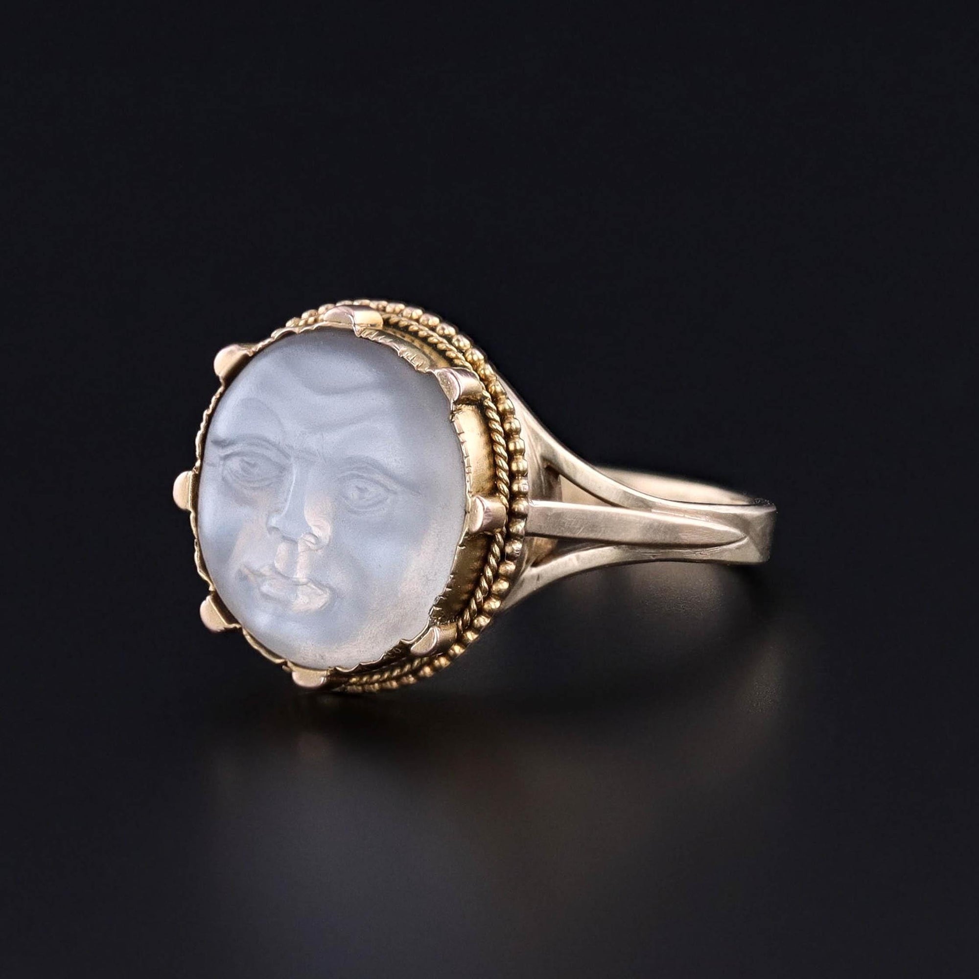 The side view of our antique man in the moon ring, originally a Victorian era stickpin turned into a ring.  It&#39;s 14k gold.