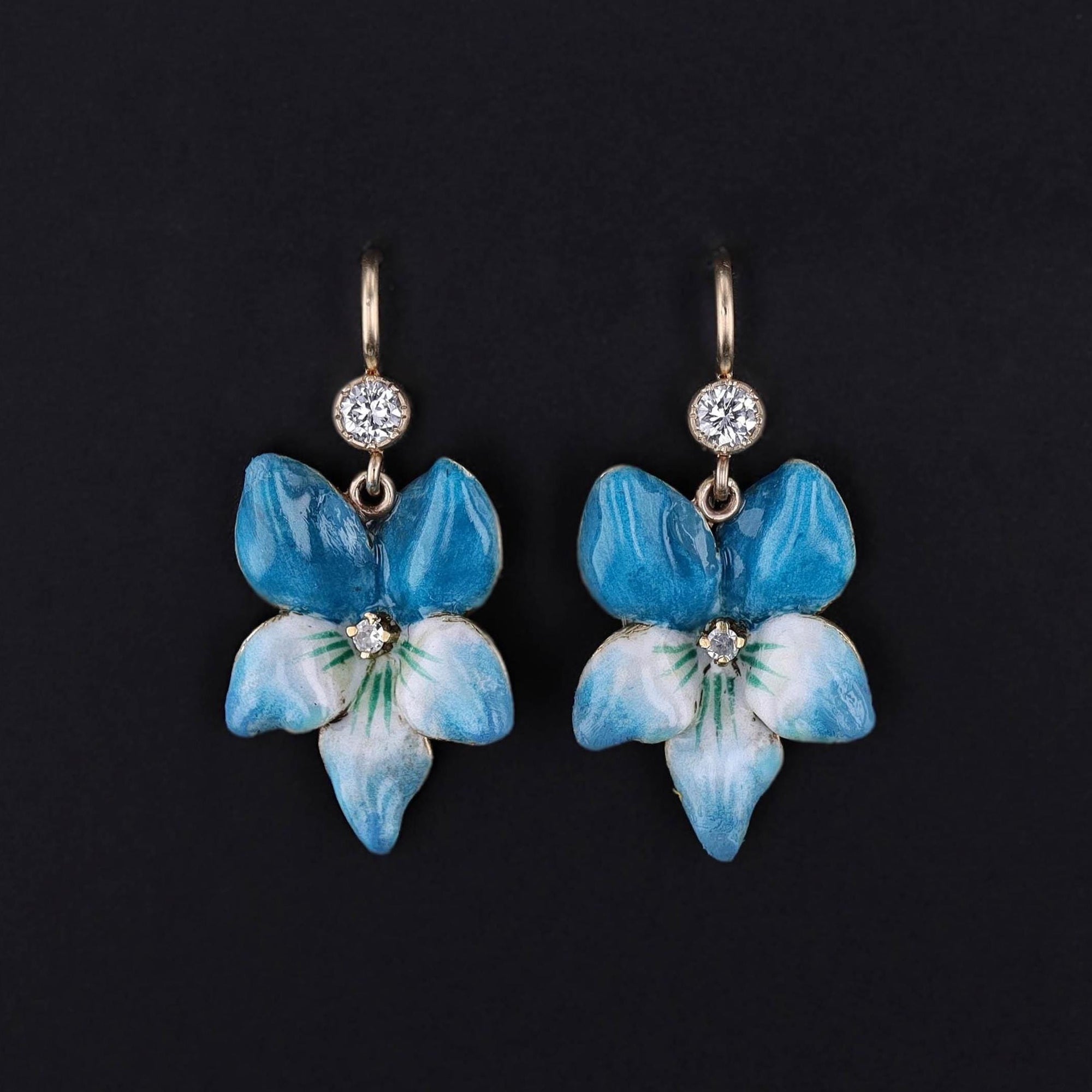 Vintage enamel earrings with diamonds.  The 14k gold floral earrings are blue violets.