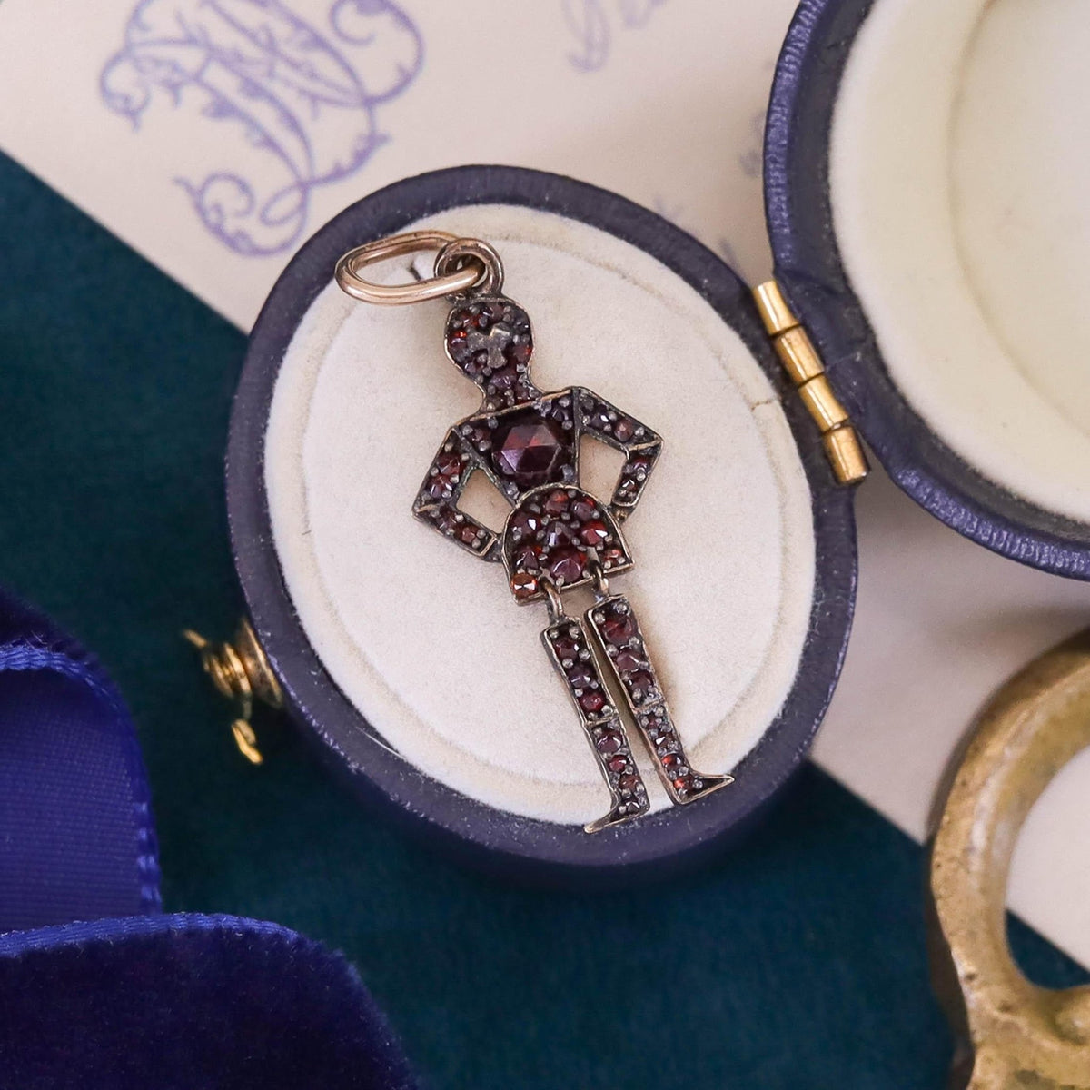 Victorian Bohemian Garnet Person Charm - Trademark Antiques