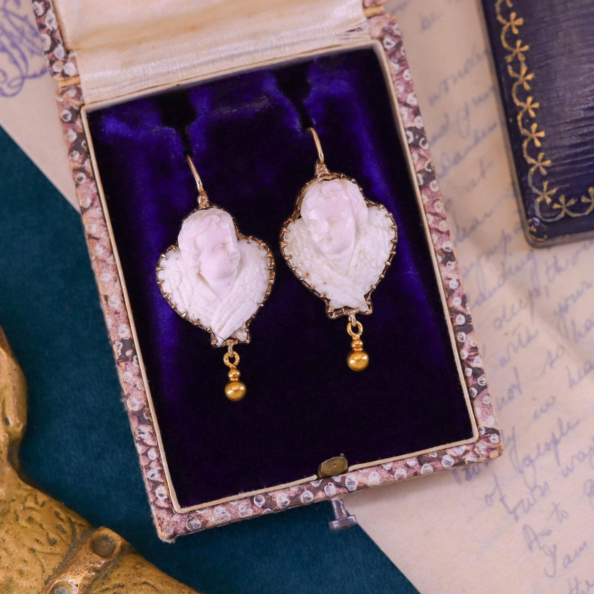 Victorian Carved Angel Skin Coral Cameo Cherub Earrings - Trademark Antiques