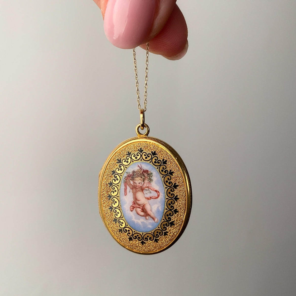 Victorian Cherub Locket of 18k Gold - Trademark Antiques