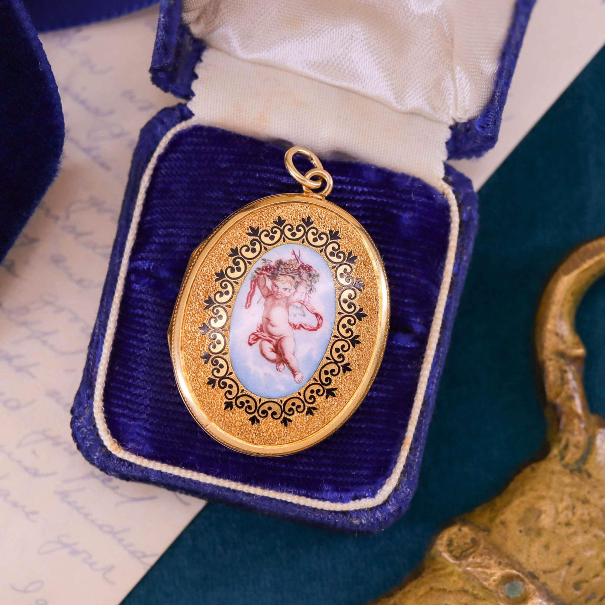 Victorian Cherub Locket of 18k Gold - Trademark Antiques