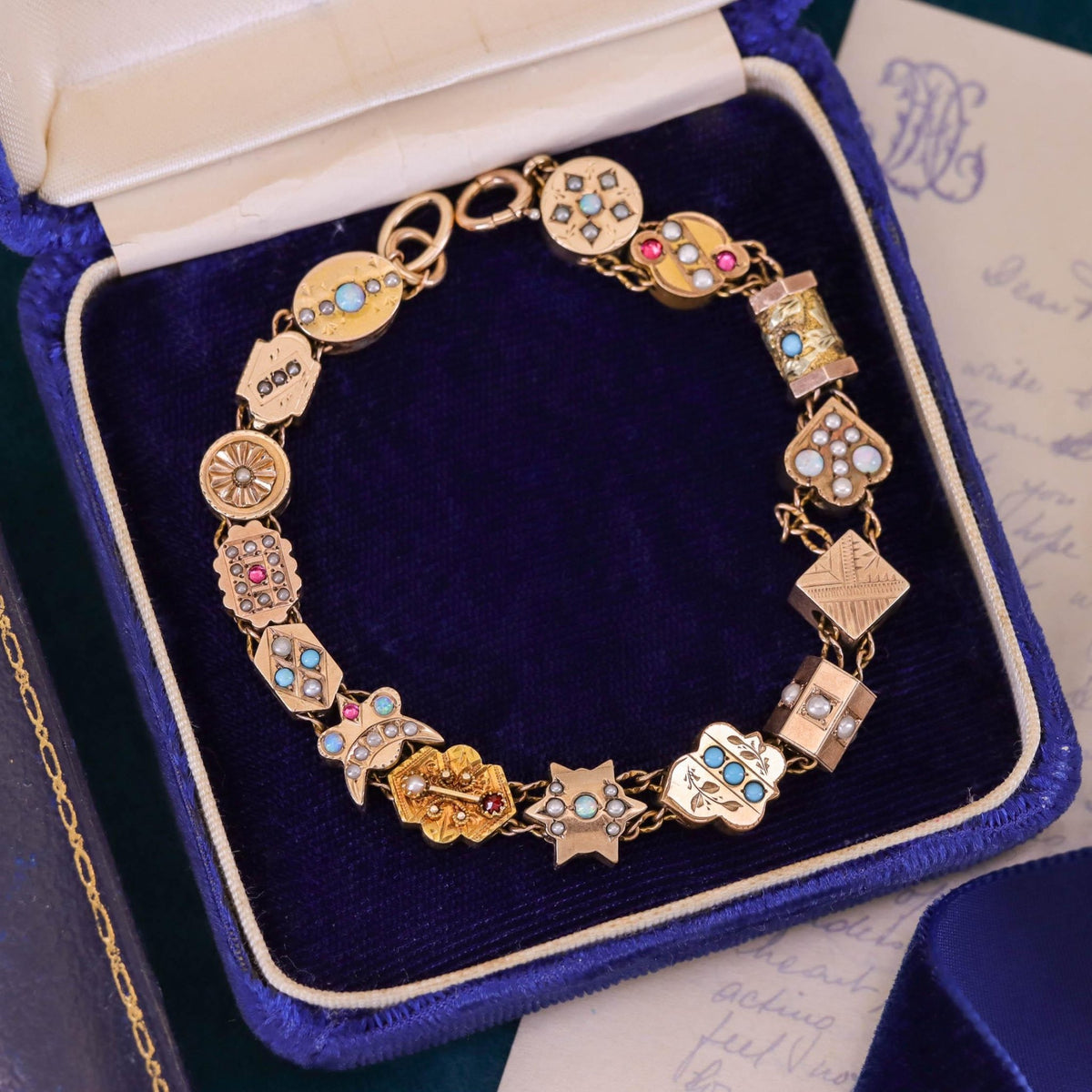 Victorian Slide Bracelet with 15 Antique Slides - Trademark Antiques