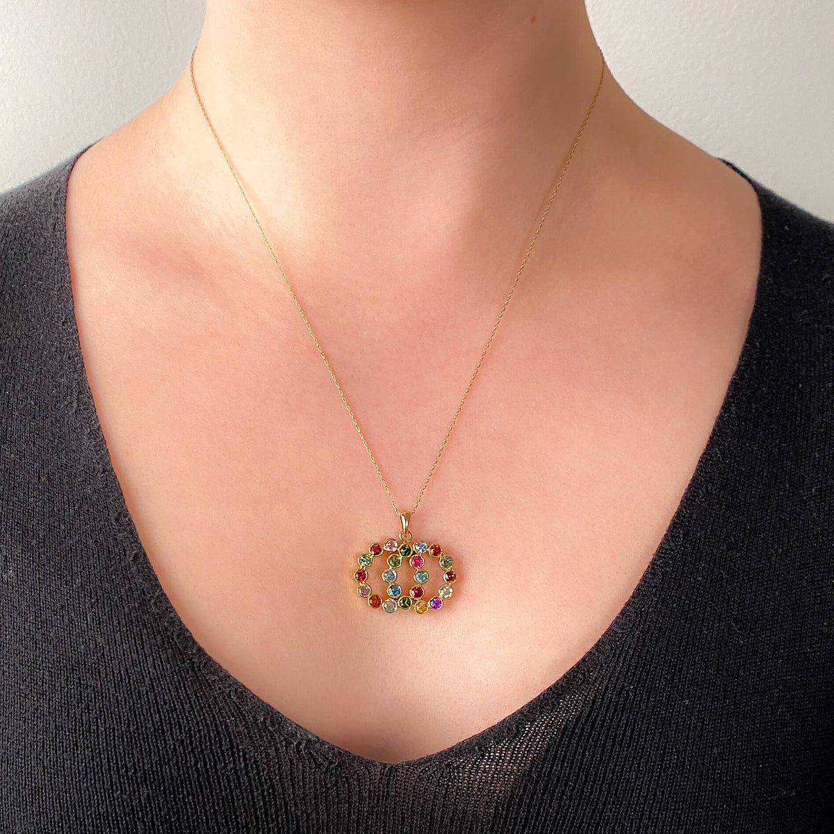 Vintage Gemstone Love Knot Pendant of 14k Gold - Trademark Antiques