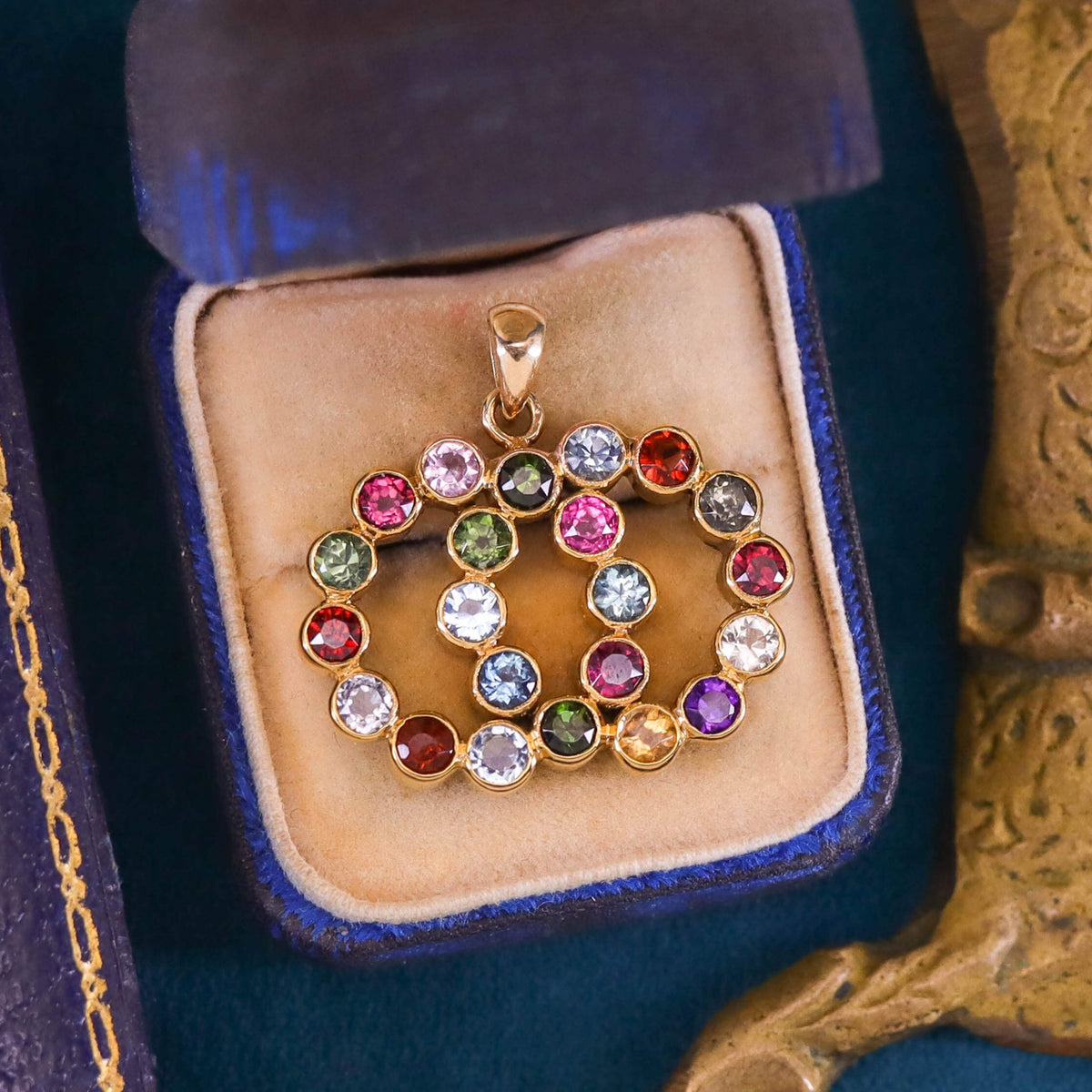 Vintage Gemstone Love Knot Pendant of 14k Gold - Trademark Antiques