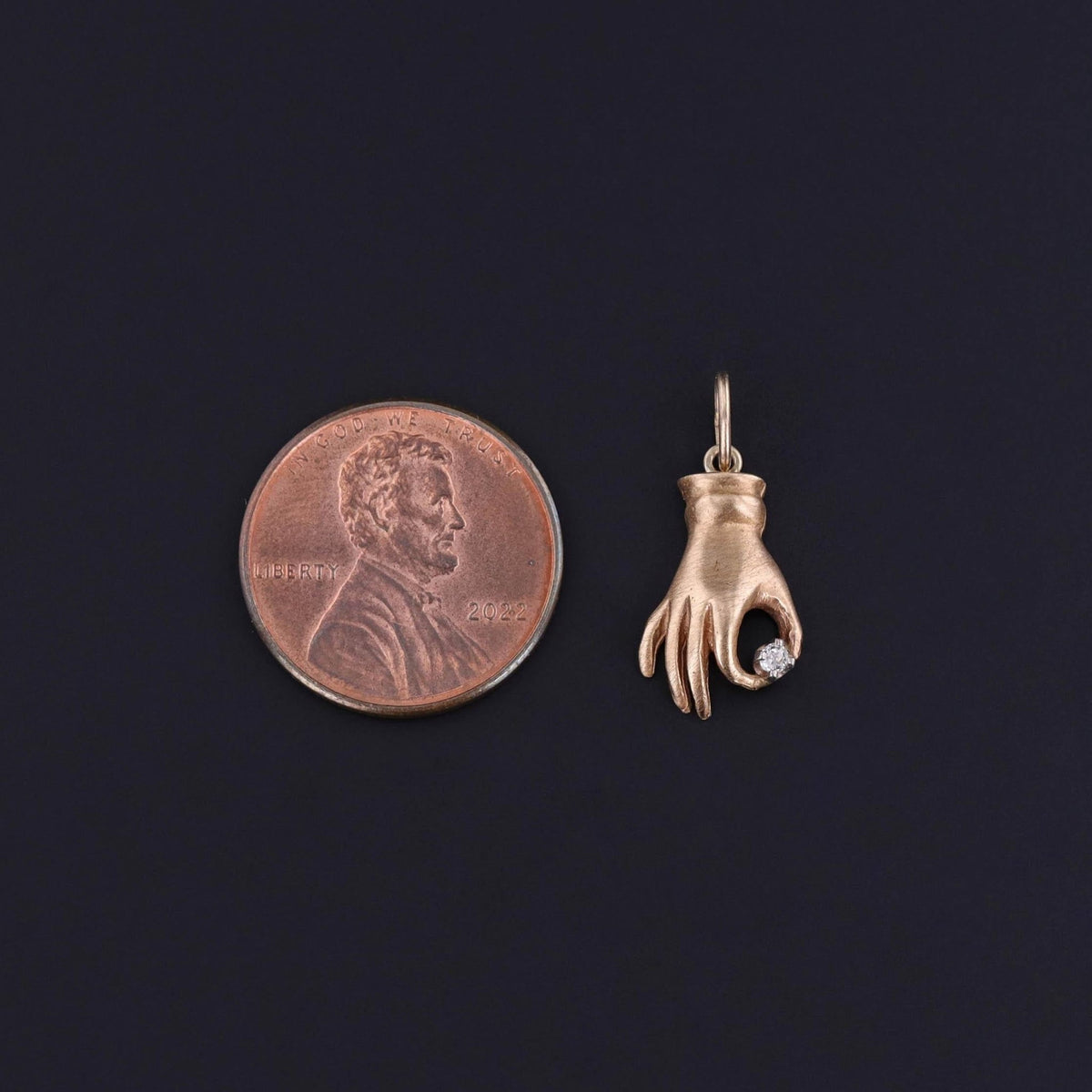 Vintage Hand Holding Diamond of 12k Gold - Trademark Antiques