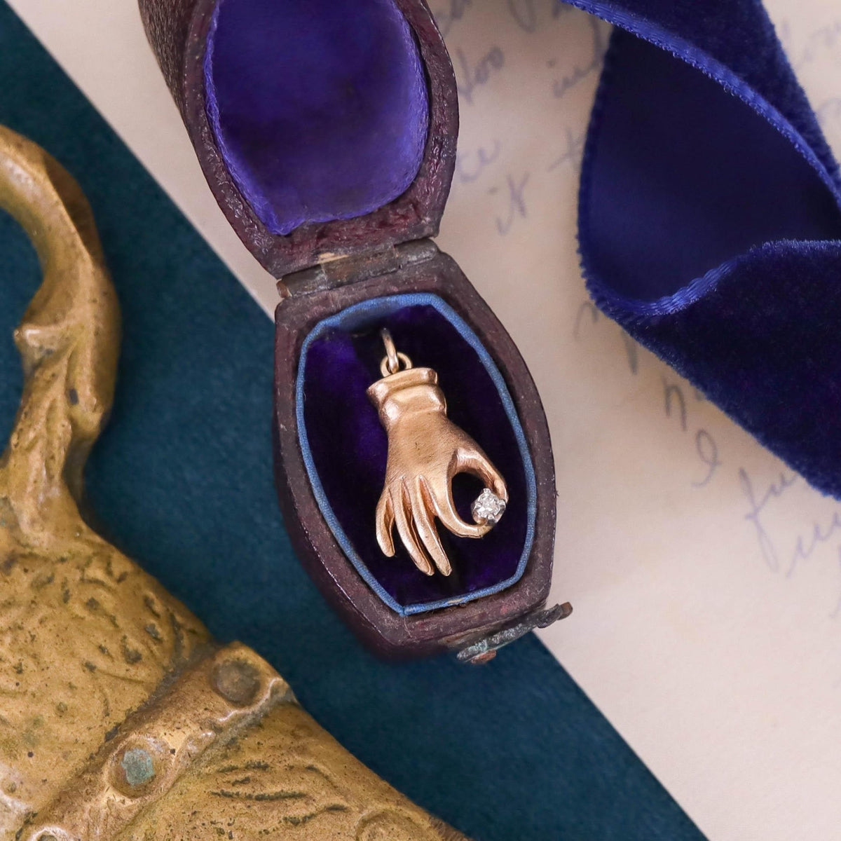Vintage Hand Holding Diamond of 12k Gold - Trademark Antiques