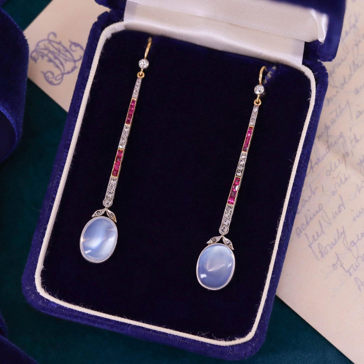 Vintage Moonstone, Diamond, and Ruby Earrings of Platinum and 18k Gold - Trademark Antiques