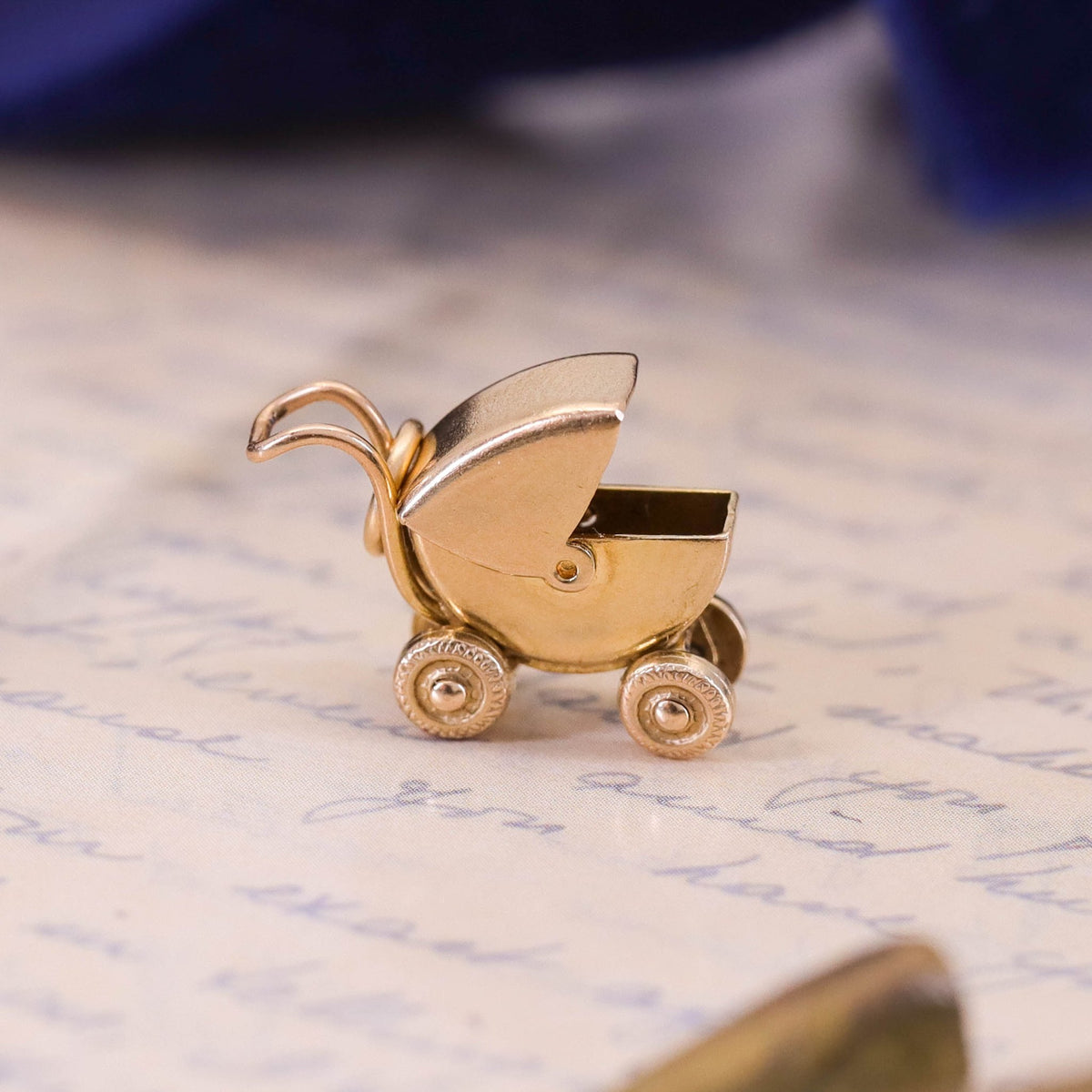 Vintage Moveable Baby Carriage Charm of 14k Gold - Trademark Antiques