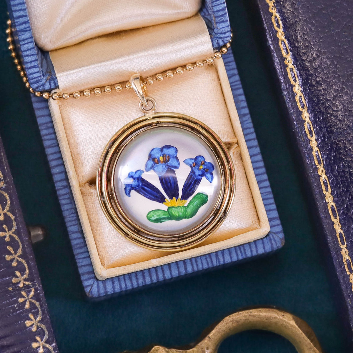 Vintage Reverse Painted Crystal Flower Pendant of 14k Gold - Trademark Antiques