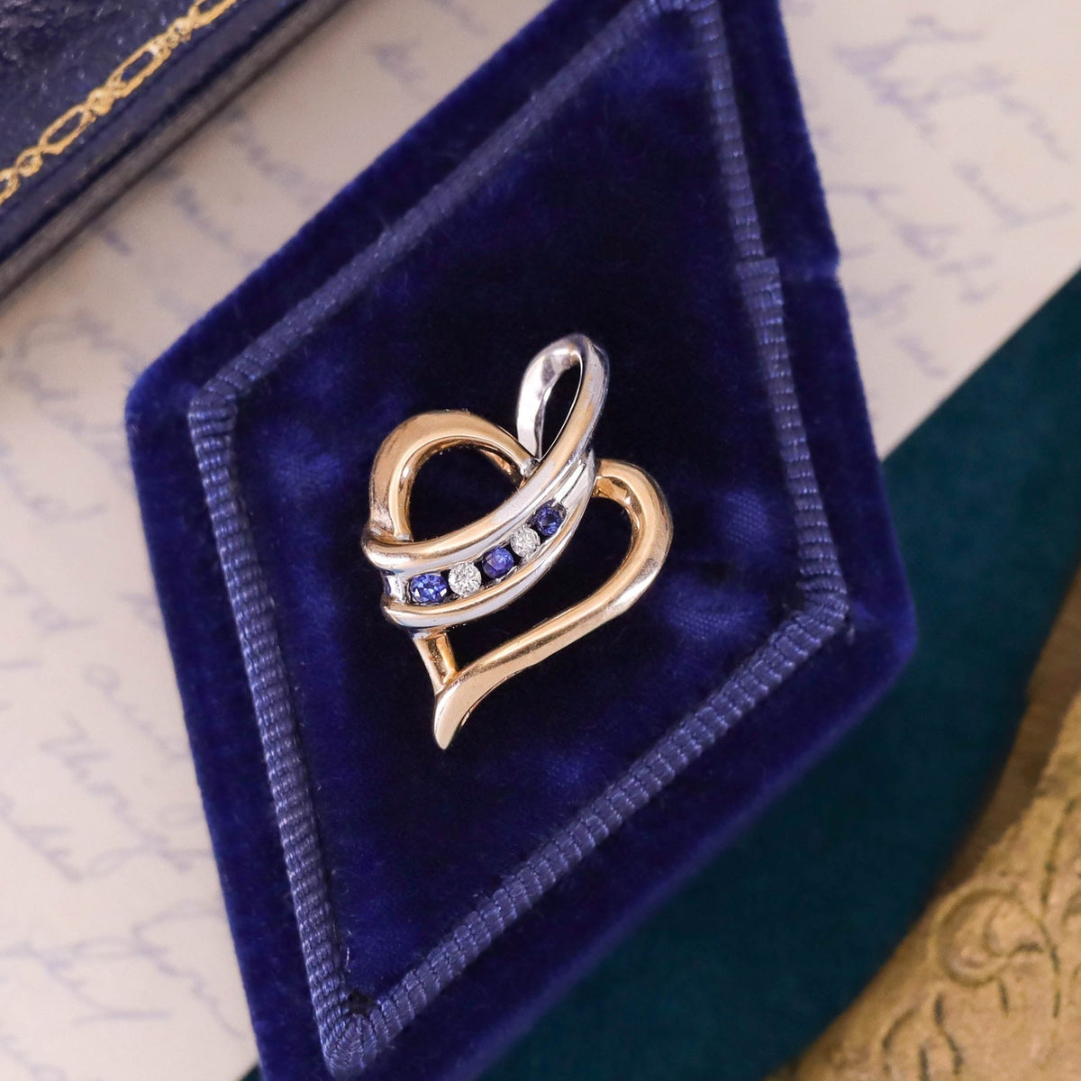 Vintage Sapphire and Diamond Heart Pendant of 10k Yellow and White Gold - Trademark Antiques