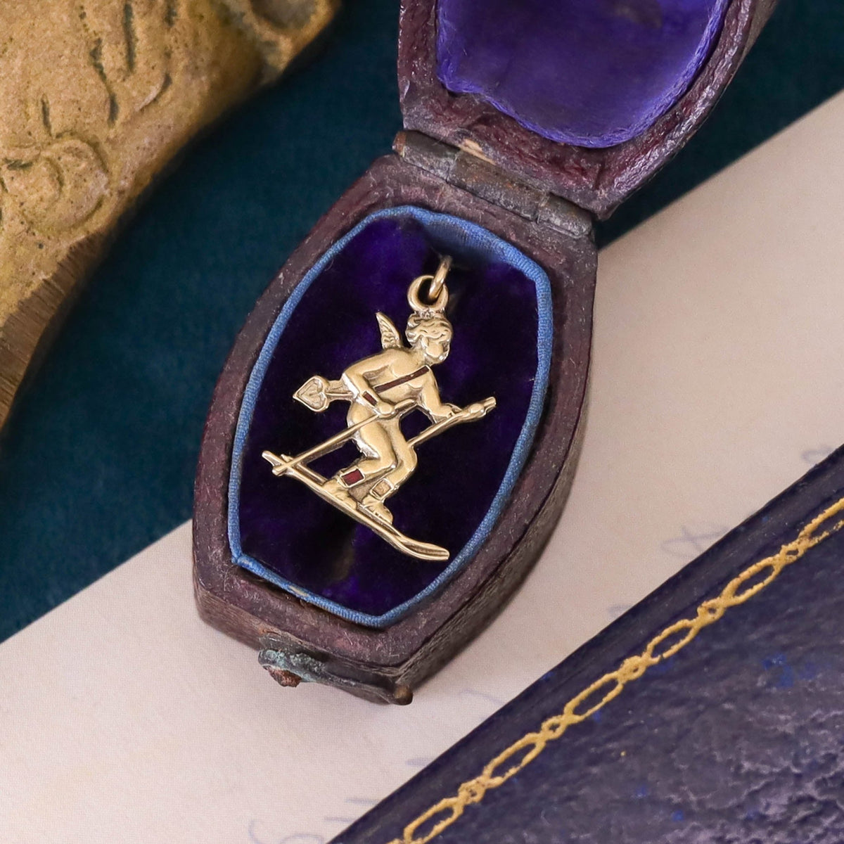 Vintage Skiing Cupid Charm of 14k Gold - Trademark Antiques