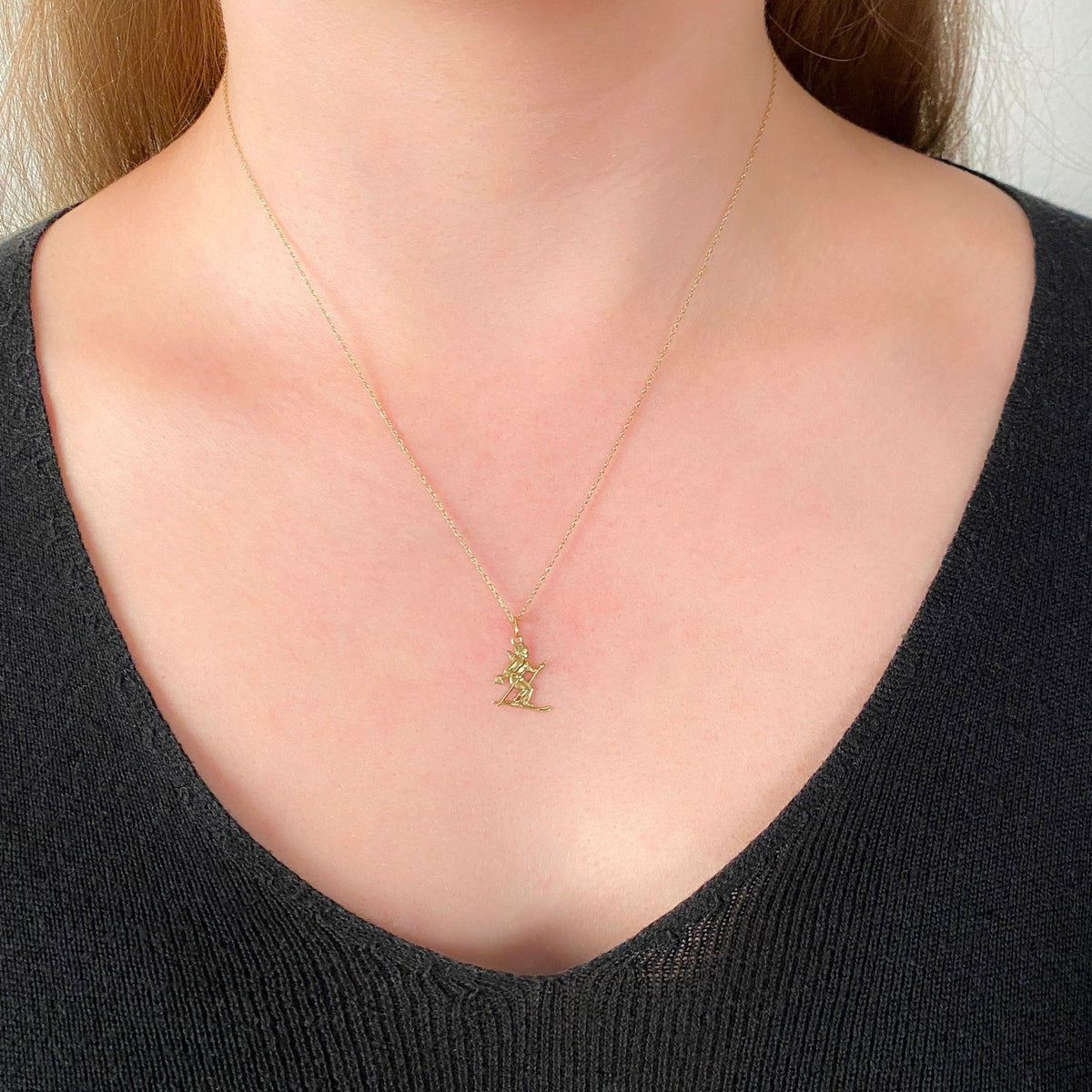Vintage Skiing Cupid Charm of 14k Gold - Trademark Antiques