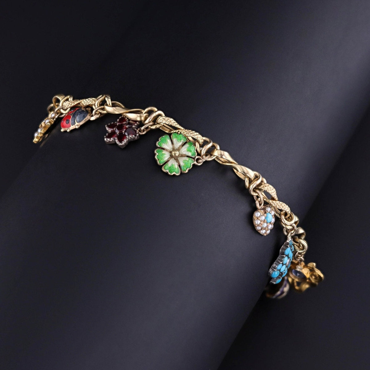 10k Gold Charm Bracelet with 10 Gemstone and Enamel Charms - Trademark Antiques
