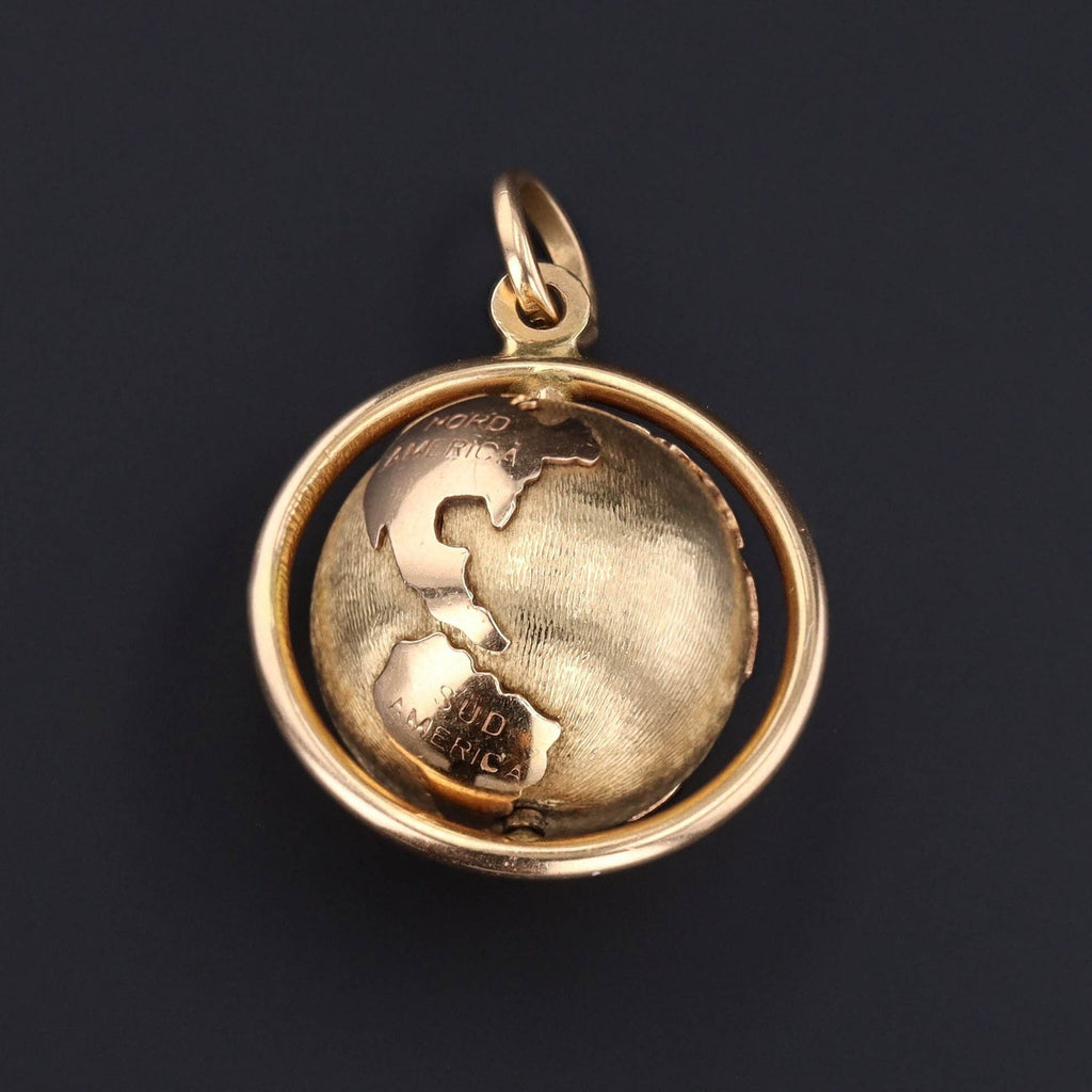 18K gold globe necklace. - Bukowskis