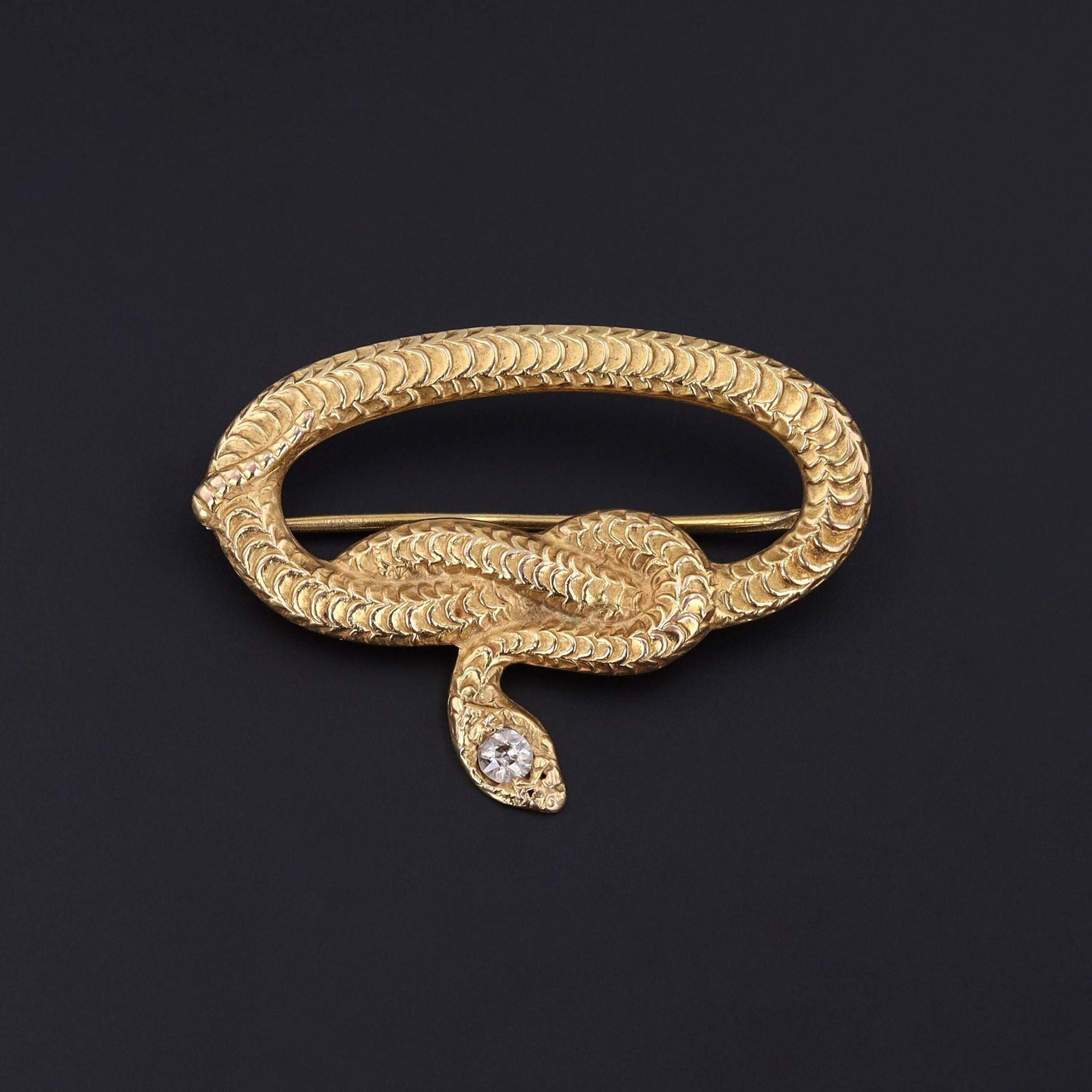 Antique Snake Brooch of 14k Gold with a Diamond Accent