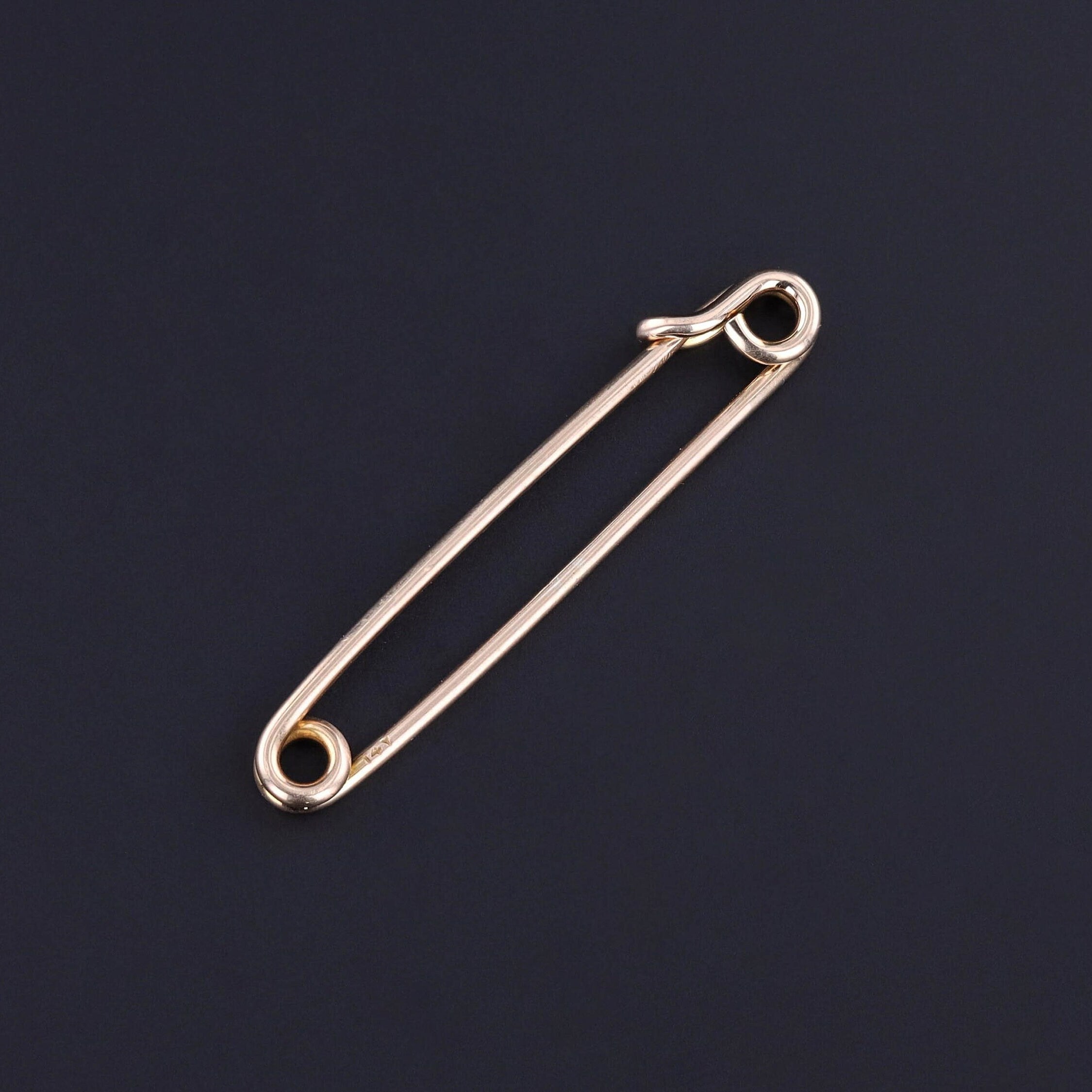 silver safety pin