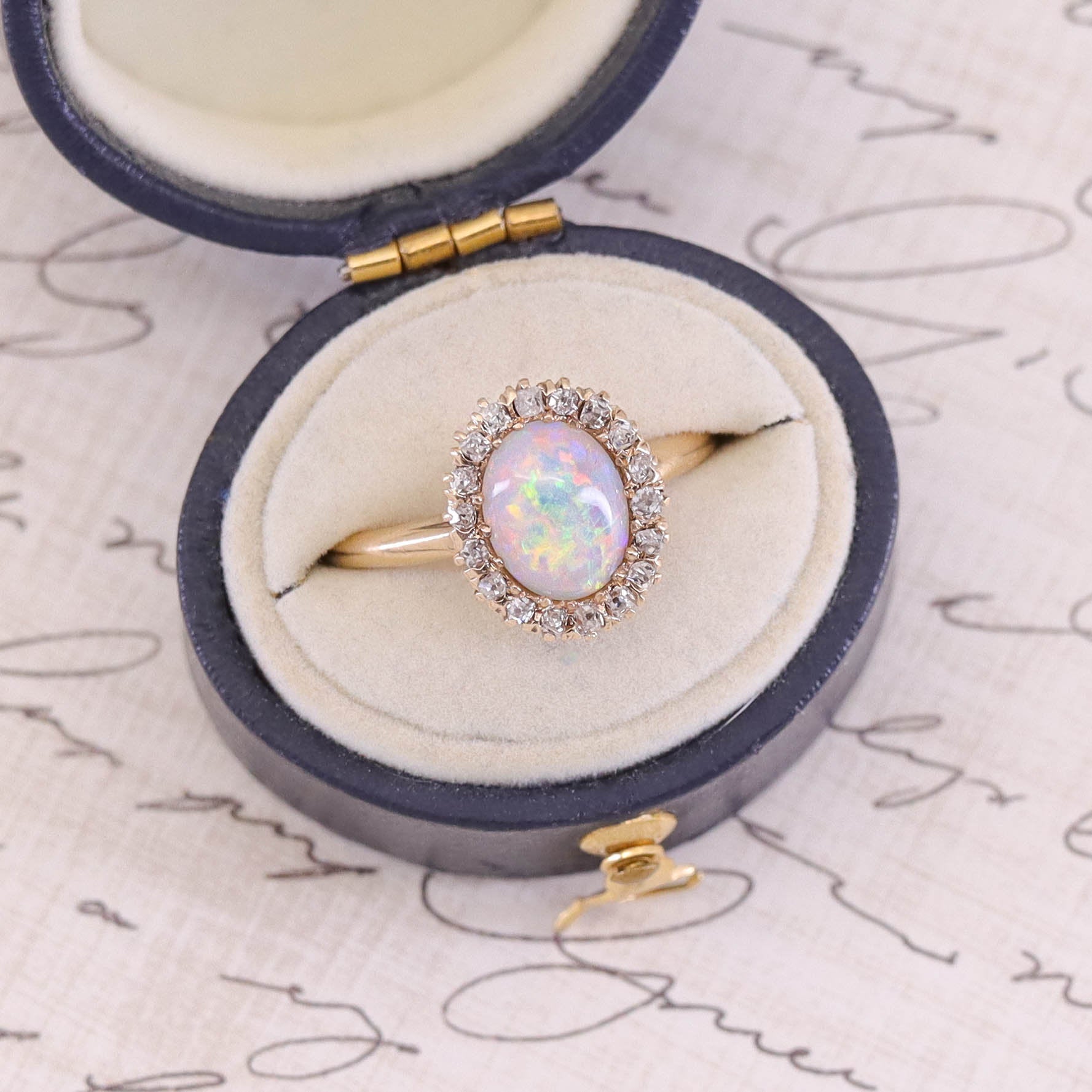 Antique Opal and Diamond Halo Ring of 14k Gold