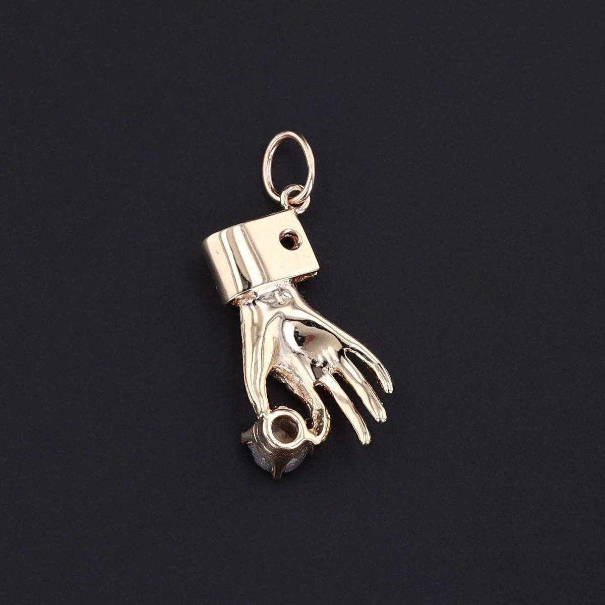 Vintage Hand Holding Gray Star Sapphire Charm of 14k Gold - Trademark Antiques