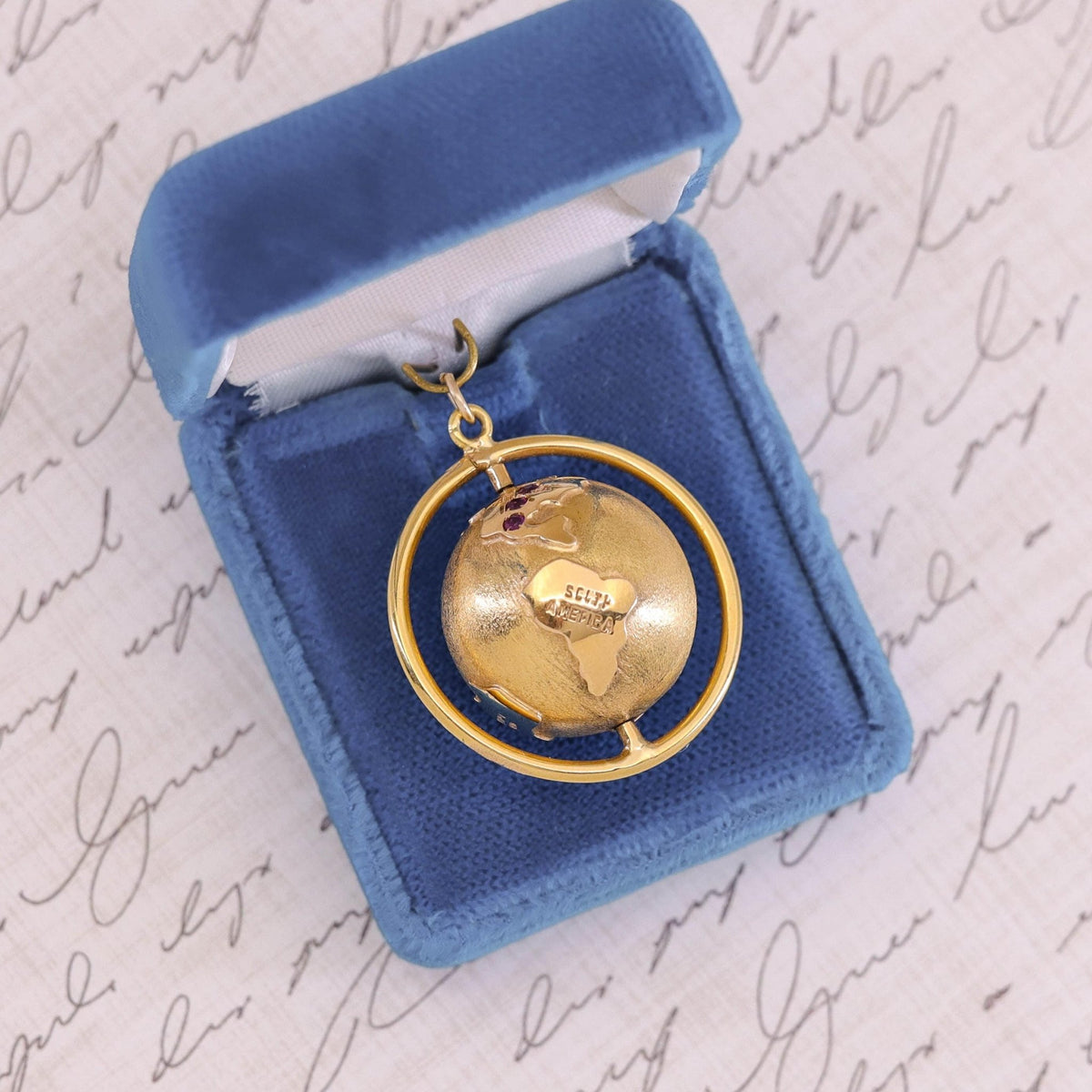 Vintage Spinning Globe Pendant of 18k Gold - Trademark Antiques